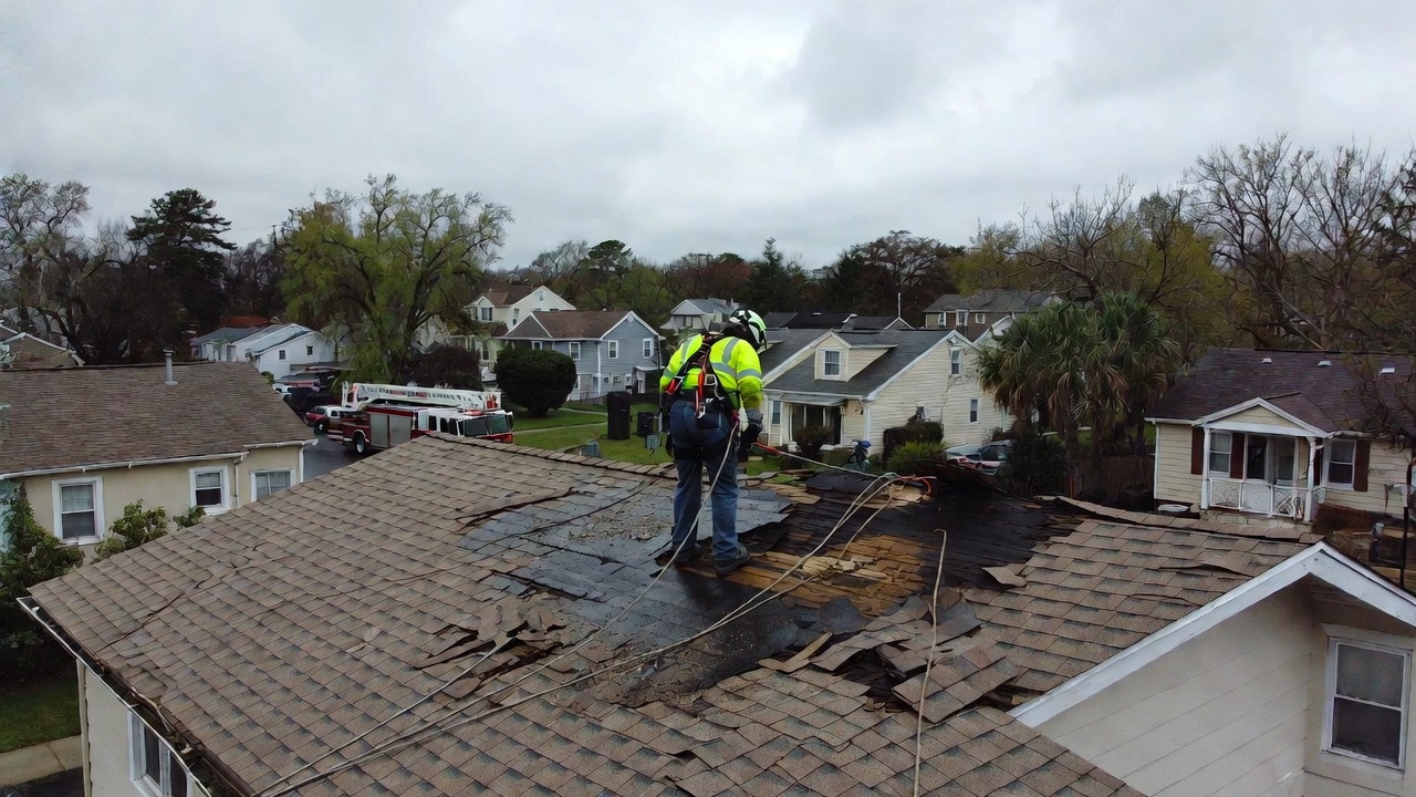 Roofing contractors near me – professional roofing team on residential roof USA 2026